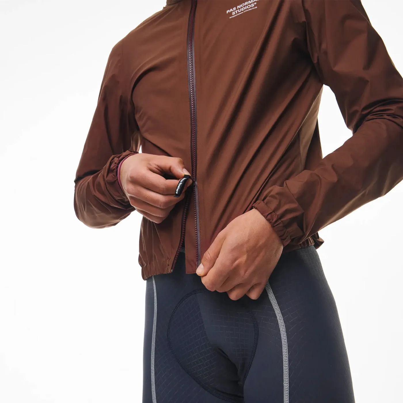 Pas Normal Studios Mechanism Pertex Rain Jacket - Brown
